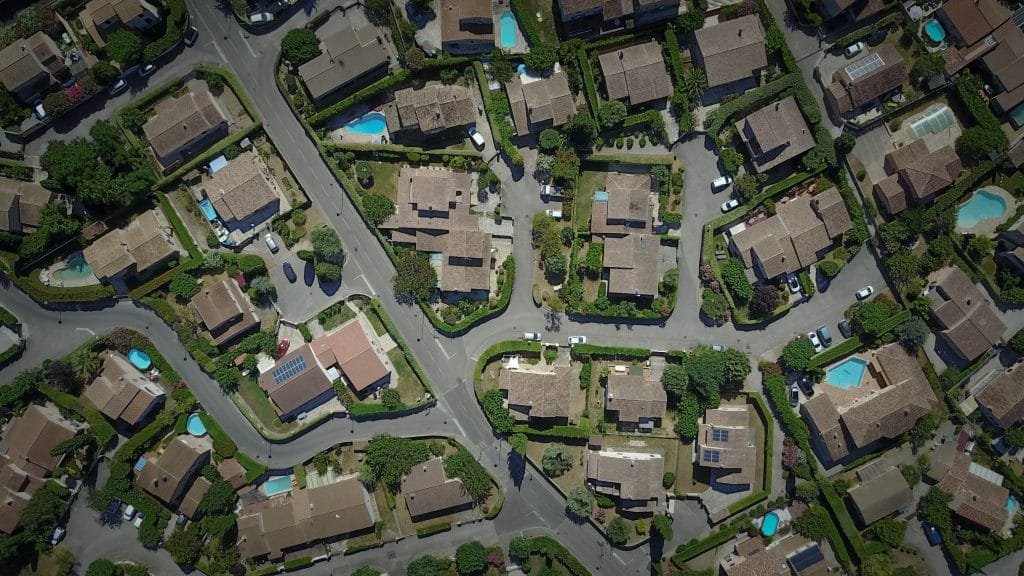 Aerial view of houses. Separate Property and Jointly Acquired Property by Domestic Partners