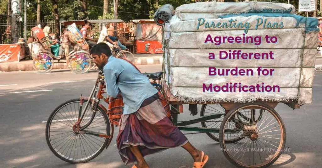 Florida Parenting Plans: Agreeing to a Different Burden for Modification. Man pushing trike heavy burden with sacks. Photo by Adli Wahid (Unsplash).