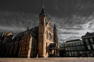 The Hague building against gray storm clouds. International Child Abduction The Hague Convention. 